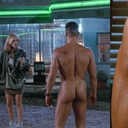 A naked Jean-Claude Van Damme shows his ass