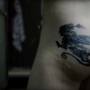 Taron Egerton showers in a scene from British TV Show 'The Smoke'
