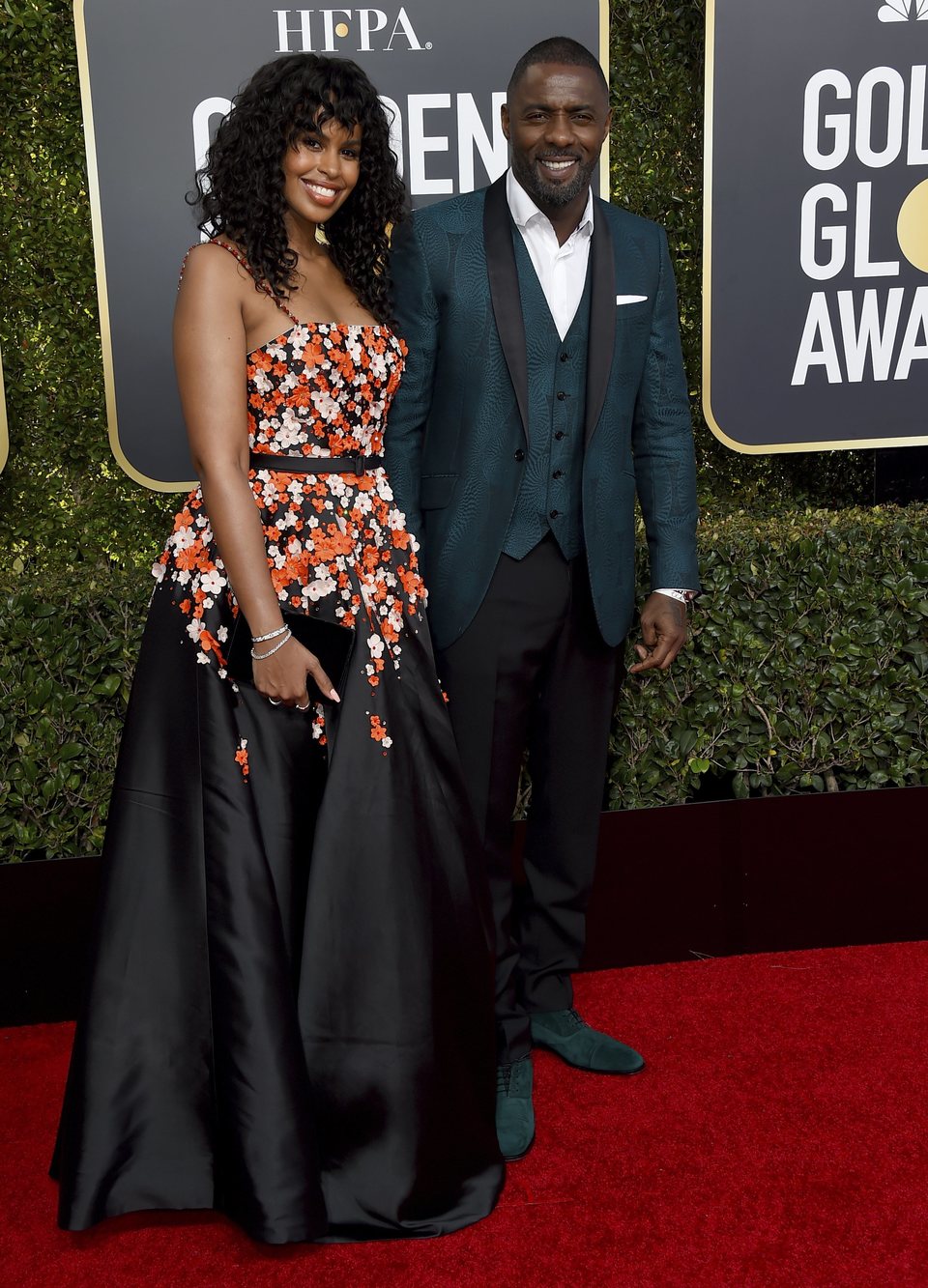 Idris Elba and Sabrina Dhowre on the red carpet at the Golden Globes 2019