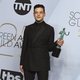 Rami Malek with his SAG award for Best Male Actor