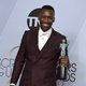Mahershala Ali with his SAG award for Best Actor in a Supporting Role