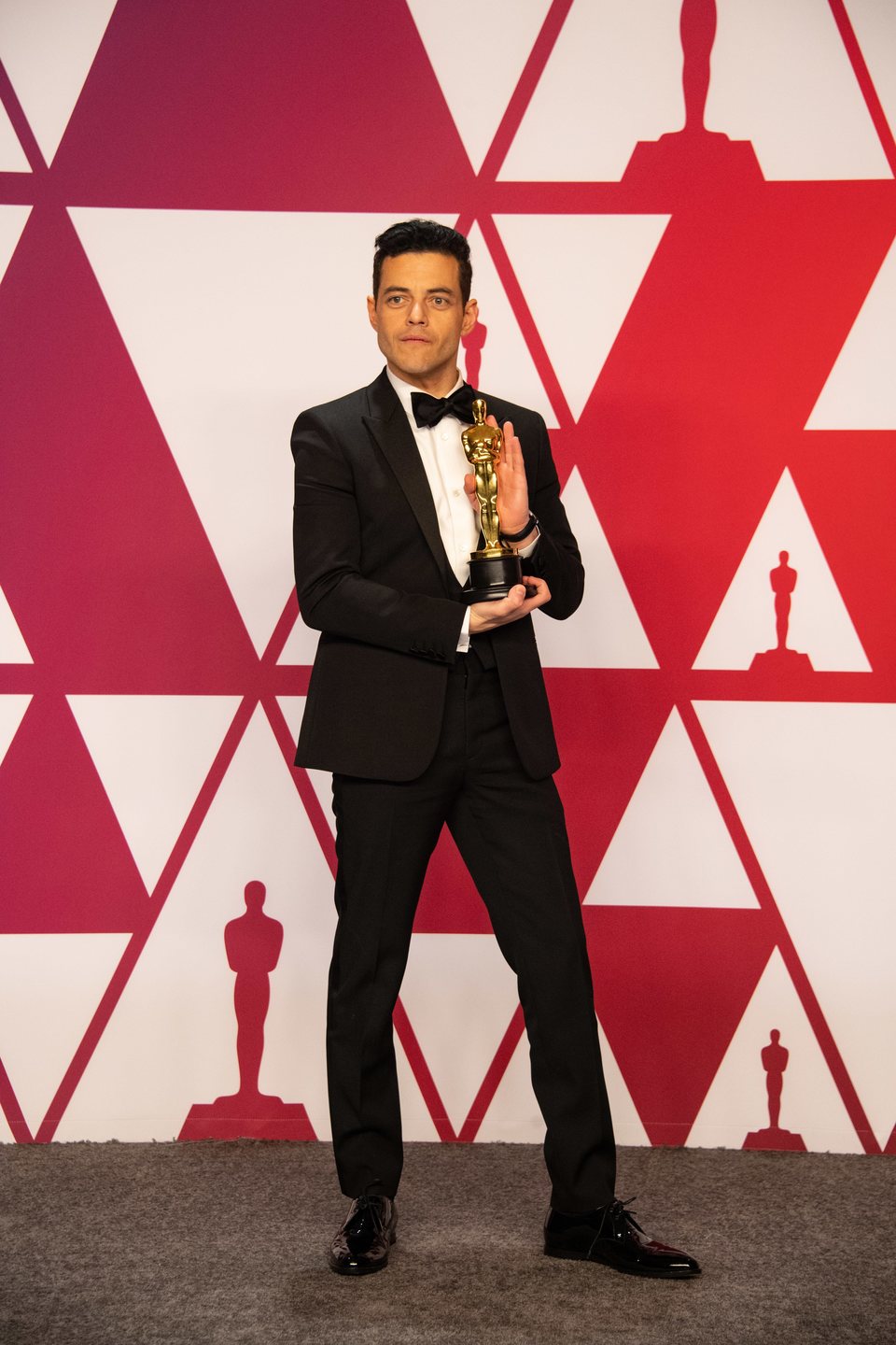 Rami Malek poses with his Oscar
