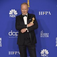 Stellan Skarsgård poses with his Golden Globe for 'Chernobyl'