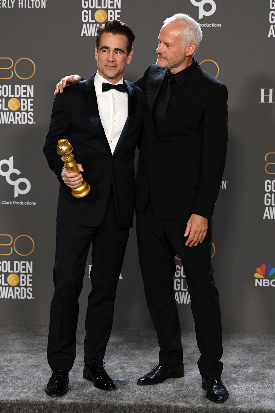 Colin Farrell and Martin MacDonagh pose as winners at the Golden Globes 2023