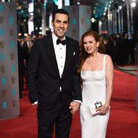 Sacha Baron Cohen and Isla Fisher at the 2016 BAFTA Awards' red carpet