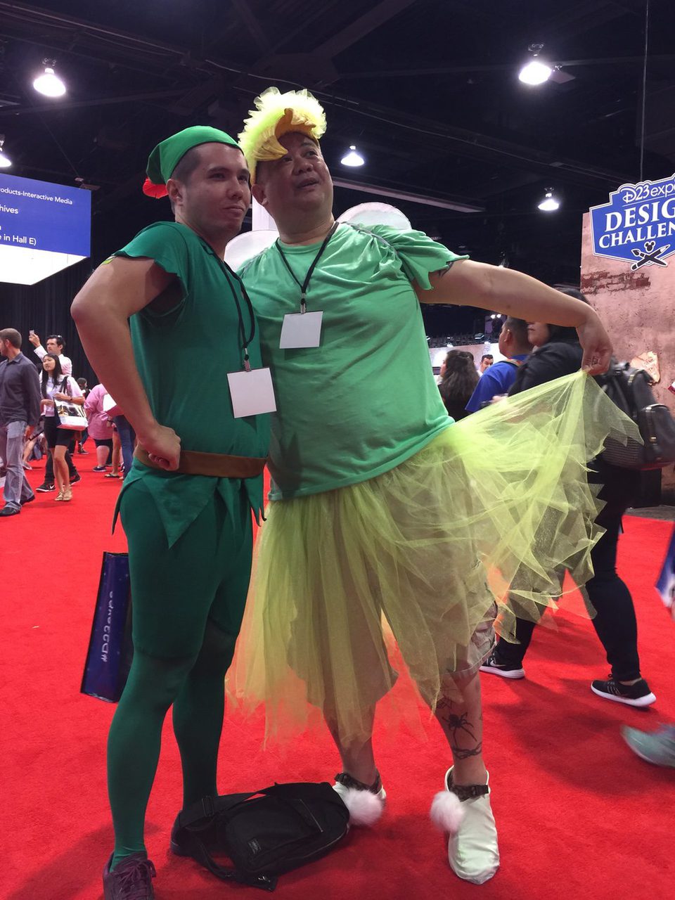 Two fans dressed up like Peter Pan and Tinkerbell in the D23