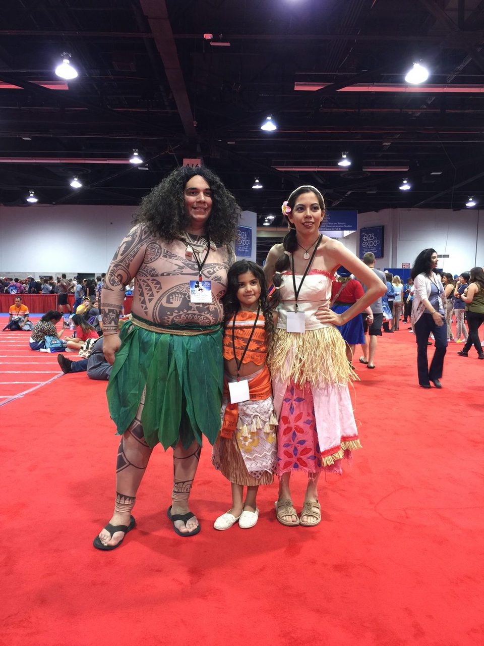 Family dressed up like characters of 'Moana' in the D23