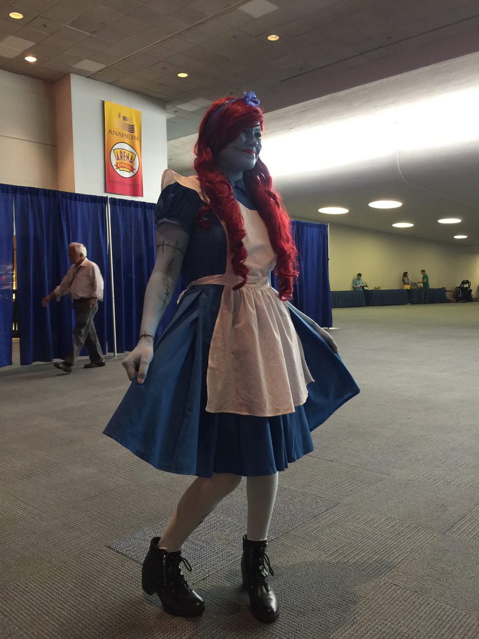 Fan dressed up like Sally and Alice in the D23