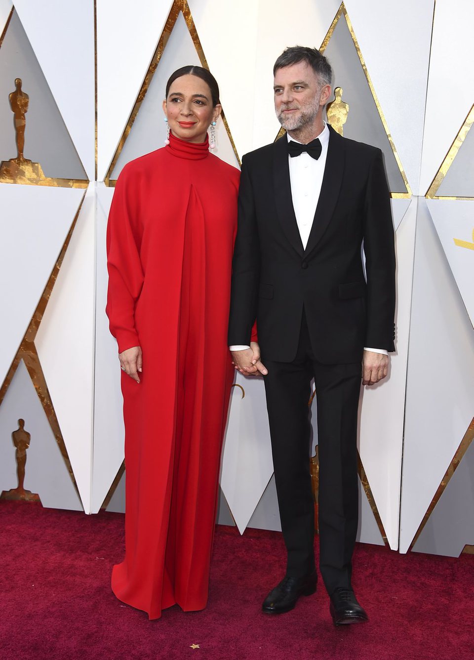 Paul Thomas Anderson and his woman at the red carpet