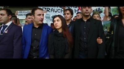 'On Her Shoulders' Trailer