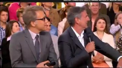 A man fires in the middle of a live interview with Christoph Waltz at the Cannes Film Festival