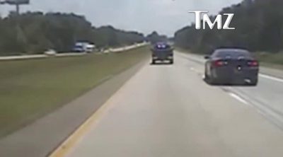 Jake Lloyd runs away from the police in his car